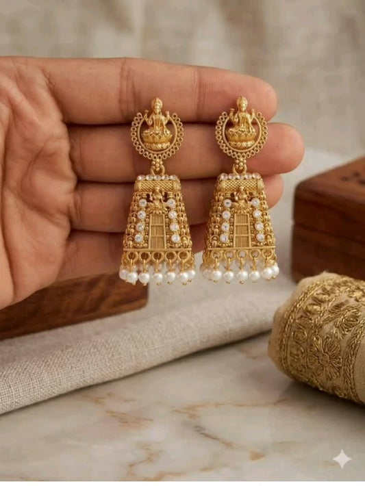 Traditional Matte Gold Lakshmi Temple Jhumka Earrings with White Crystals and Pearl Drops